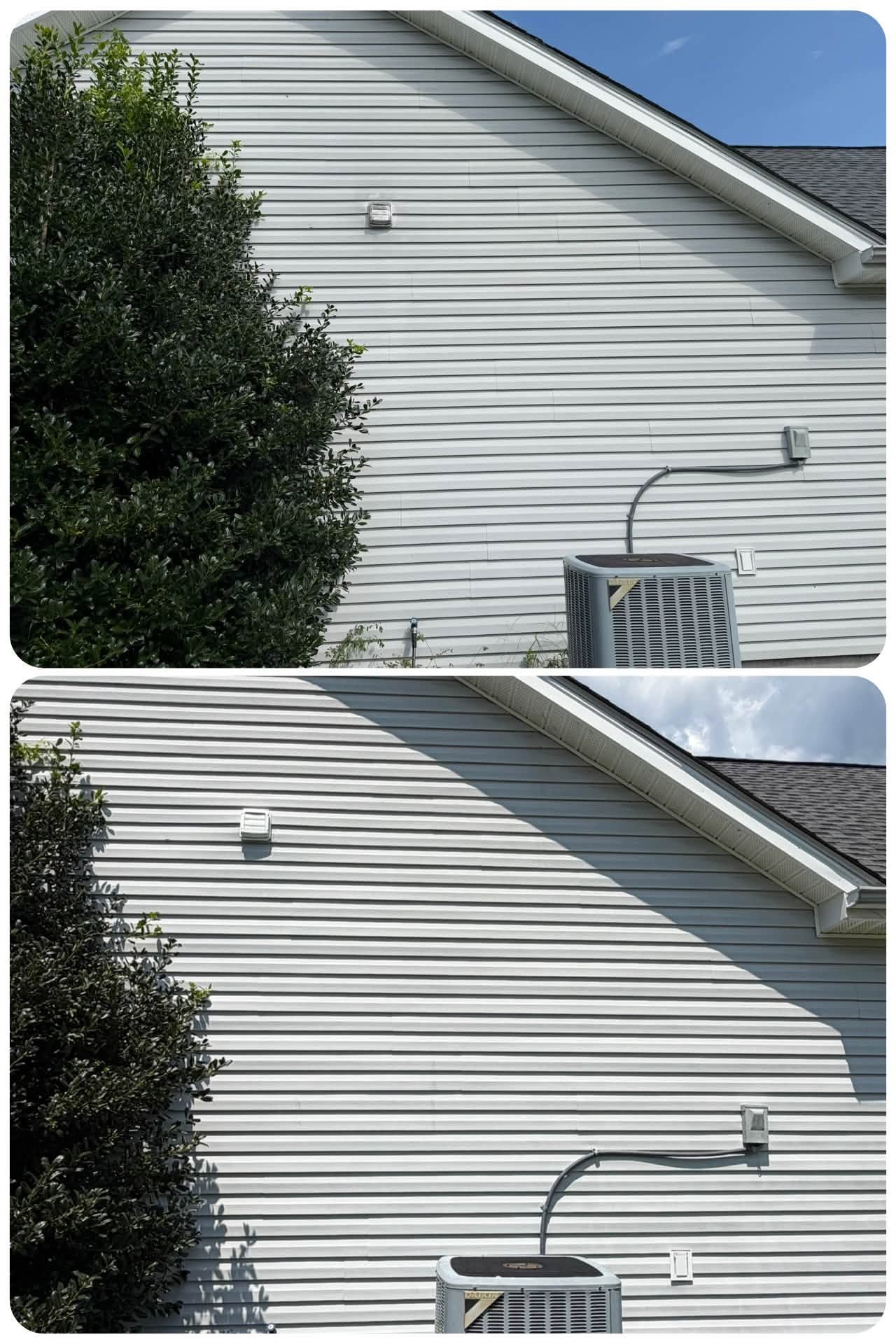 Exterior siding and A/C area cleaned by pressure washing