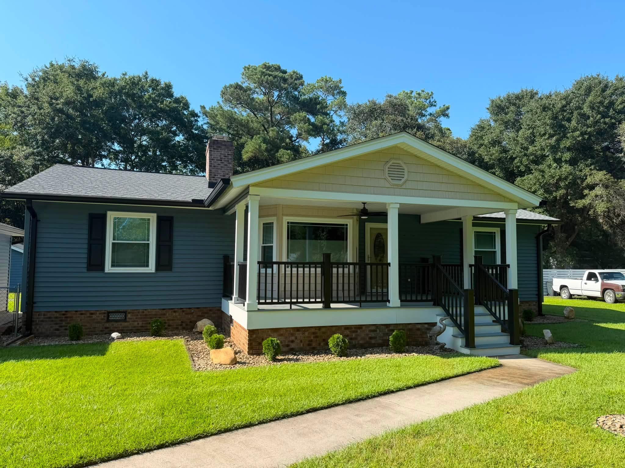 Freshly mowed and edged front lawn with clean lines